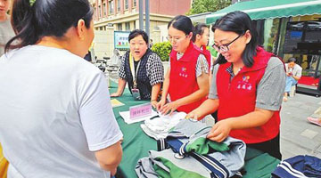 郑州这所小学校服循环18年省钱70万