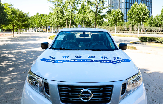 郑州城管勤务车辆换新装打今儿起请认准这个新标识