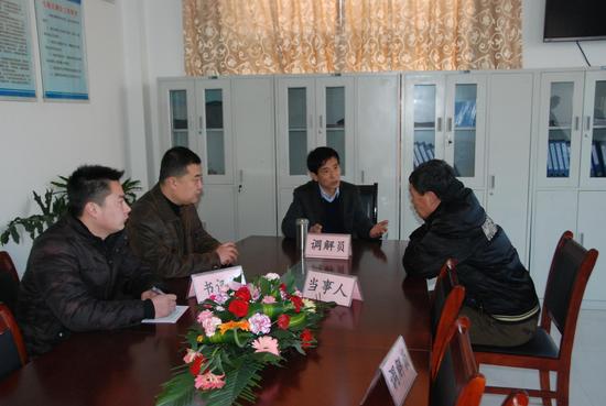 焦作沁阳市人民调解委员会主任丁满堂半世调解缘邻里满堂和