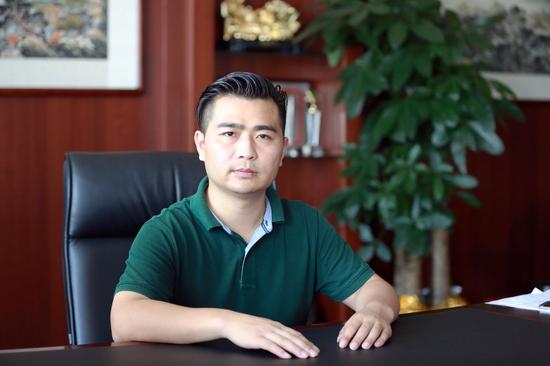湖南永雄资产管理集团新任总裁周雄.