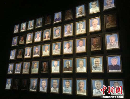 生命之灯逐渐熄灭的南京大屠杀幸存者照片墙。 申冉 摄