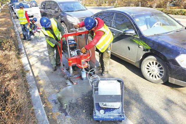 长春路边停车位正在安装地磁传感器