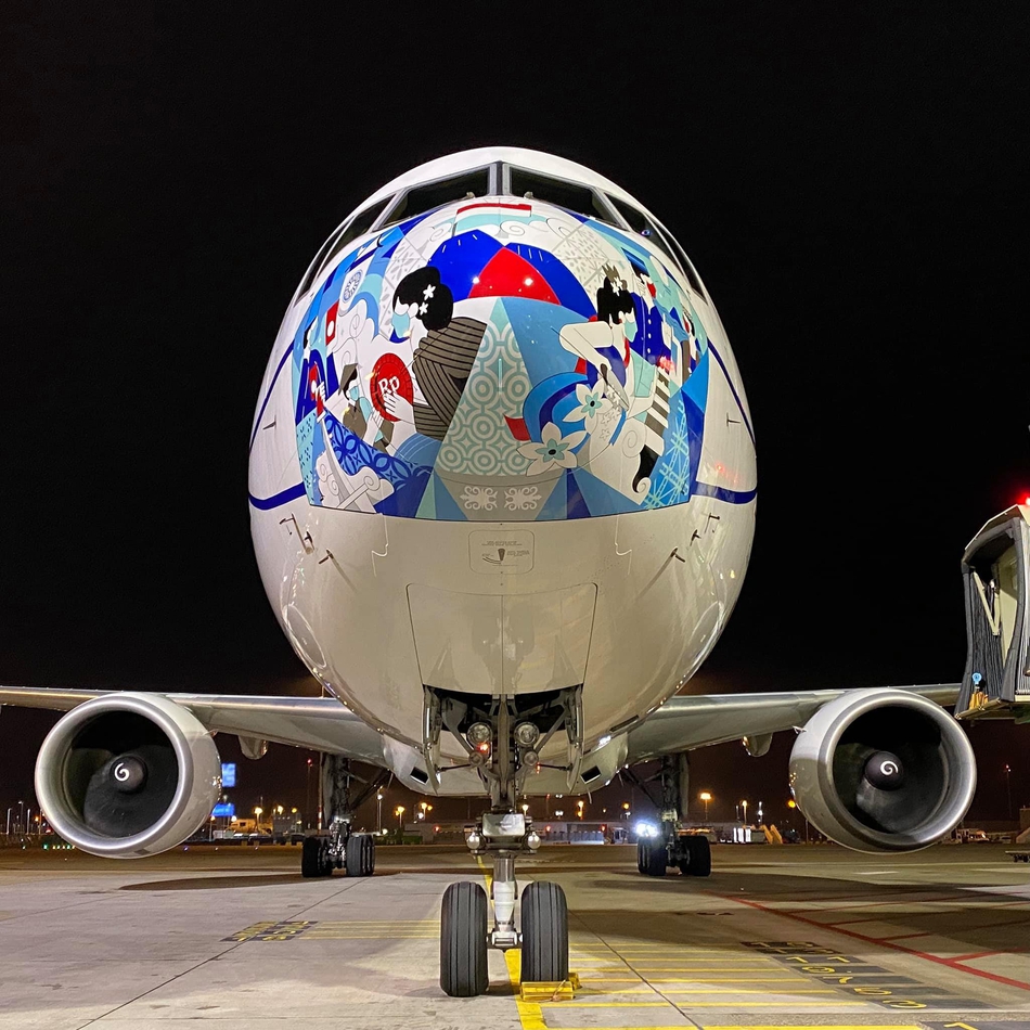 嘉鲁达印尼航空公司的飞机也戴上了口罩_高清图集_新浪网