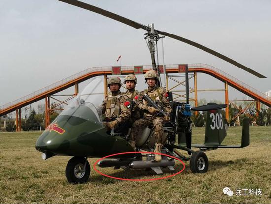 图注:"猎鹰"攻击型旋翼机可以挂载激光制导导弹,图中红圈内为导弹特写