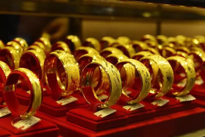 金价上涨，8年前借的3斤黄金怎么还？