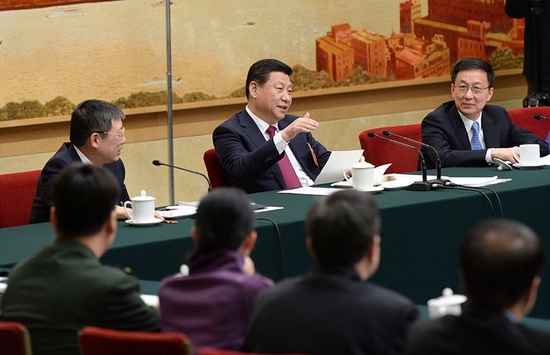  2014年3月5日，习近平总书记参加十二届全国人大二次会议上海代表团的审议。