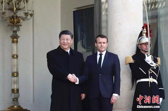 当地时间3月25日，中国国家主席习近平在巴黎爱丽舍宫同法国总统马克龙会谈。中新社记者 盛佳鹏 摄