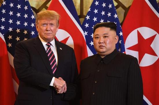 2月27日,特朗普与金正恩在越南河内举行会晤(图/AFP)