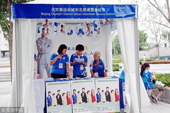 伦敦奥运会烟花 北京奥运会的“城市白发志愿者”。图片来自视觉中国