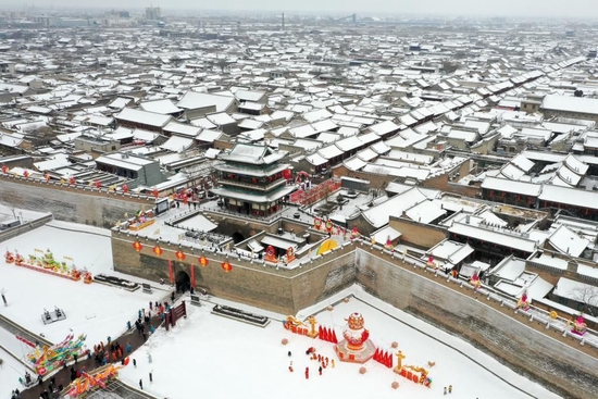 1月14日拍摄的山西平遥古城雪景(无人机照片)。新华社发(梁生仁摄)