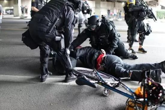 又出涉港报告 人民日报海外版：美还嫌世界不够