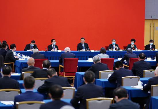  5月23日上午，习近平看望参加全国政协十三届三次会议的经济界委员，并参加联组会，听取意见和建议。