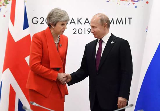 6月28日,俄罗斯总统普京与英国首相特雷莎·梅举行会晤。
