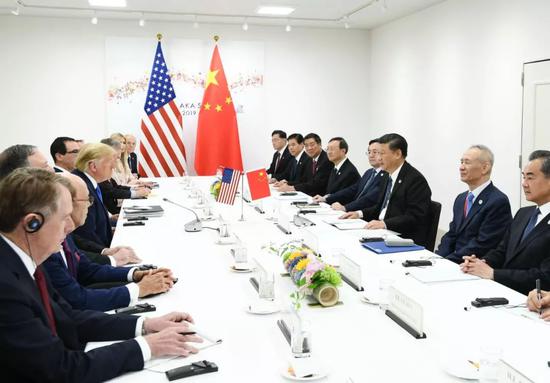  ↑6月29日，习主席同特朗普总统在大阪举行会晤。新华社记者谢环驰摄