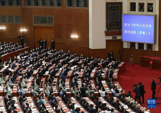 2020年5月28日，第十三届全国人民代表大会第三次会议在北京人民大会堂闭幕。新华社记者 丁海涛 摄