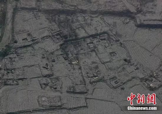 2019-06-18,汶川大地震造成的泥石流掩埋了一个村庄。(中新社记者 贾国荣摄)