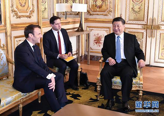  3月25日，国家主席习近平在巴黎爱丽舍宫同法国总统马克龙会谈。 新华社记者 谢环驰 摄