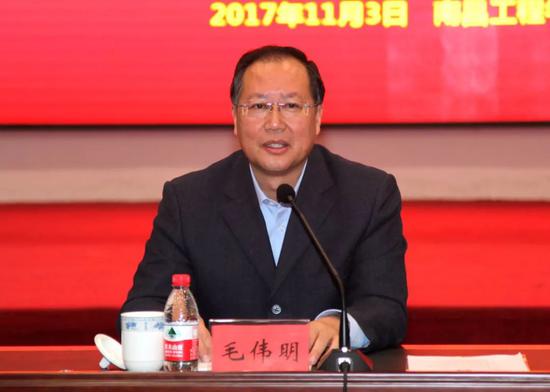 毛偉明 資料圖