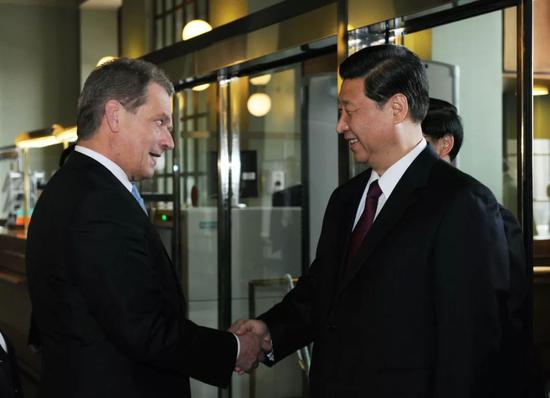 2010年3月26日,习近平在赫尔辛基碰面尼尼斯托。新华社记者饶爱夷易近摄