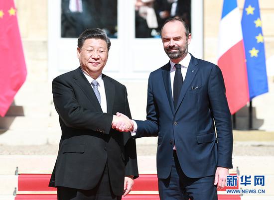3月26日，国家主席习近平在巴黎总理府会见法国总理菲利普。 新华社记者 丁海涛 摄