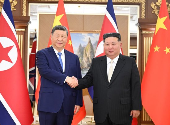 习近平同金正恩举行会谈