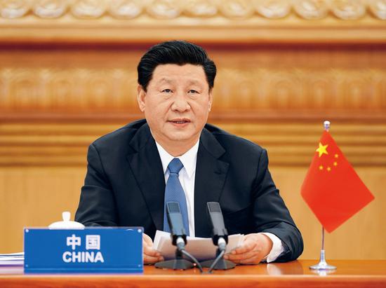 2020年3月26日，国家主席习近平在北京出席二十国集团领导人应对新冠肺炎特别峰会并发表题为《携手抗疫 共克时艰》的重要讲话。 新华社记者 李学仁/摄