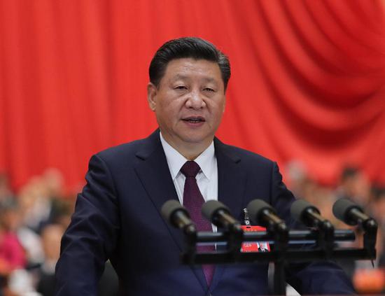 2017年10月18日，习近平在中国共产党第十九次全国代表大会上作报告。新华社记者 鞠鹏 摄