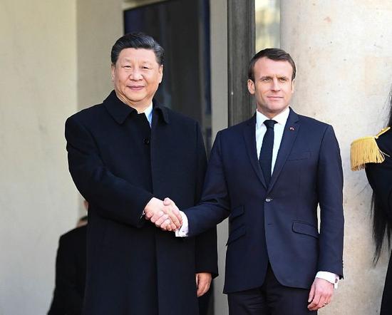  3月25日，国家主席习近平在巴黎爱丽舍宫同法国总统马克龙会谈。新华社记者 谢环驰 摄