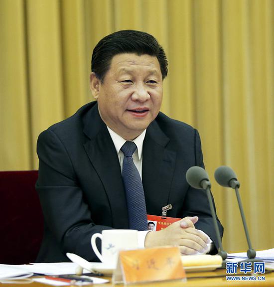 2014年12月9日至11日，中央经济工作会议在北京举行。中共中央总书记、国家主席、中央军委主席习近平发表重要讲话。 新华社记者 鞠鹏 摄