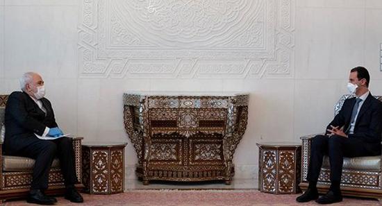 伊朗外长扎里夫与叙利亚总统阿萨德会面。图片来源：叙利亚总统府