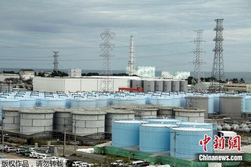 资料图：位于日本福岛第一核电站用于储存核污水的储水罐。