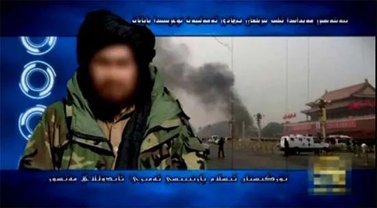  “東伊運”發(fā)布的恐怖宣傳視頻畫面（截圖自2014年7月《恐怖主義的網(wǎng)上推手——“東伊運”恐怖音視頻》電視專題片）