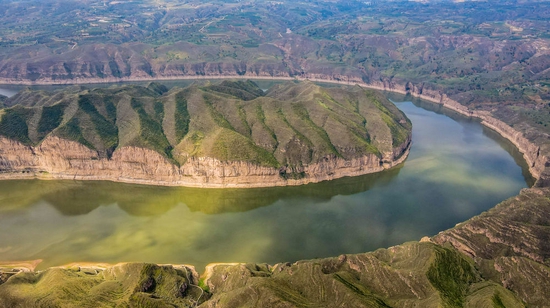 ↑这是蒙晋陕黄河大峡谷景色（无人机照片，2021年7月21日摄）。
