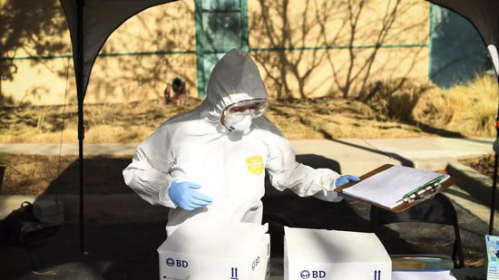 海外网美国多州单日新增病例刷新高 7月初死亡人数或达14万