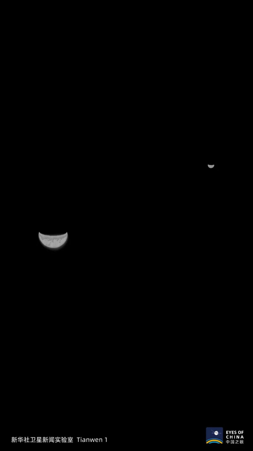 “天问一号”探测器在距离地球约120万公里处拍摄的地月合影。（“天问一号“探测器）