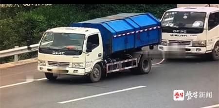 扬子晚报一根麻绳“牵线” 两辆货车高速“手拉手”龟速行驶