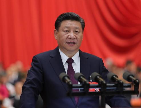 2017年10月18日，习近平在中国共产党第十九次全国代表大会上作报告。图片来源：新华社