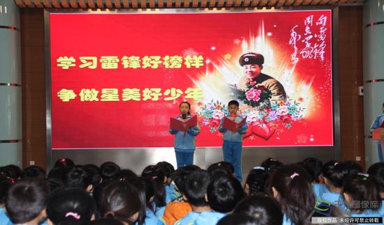 学雷锋活动日:学雷锋纪念日 北京在行动 太平桥二小宣教活动学雷锋。学校供图。