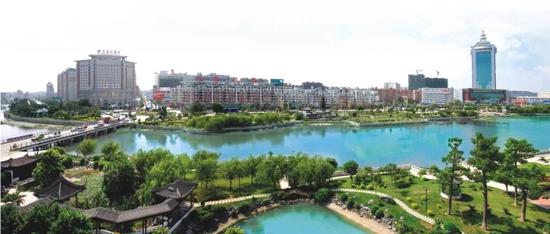 (图为兼具历史传统与现代特点的晋江城市今景 图源:晋江市人民政府官网)