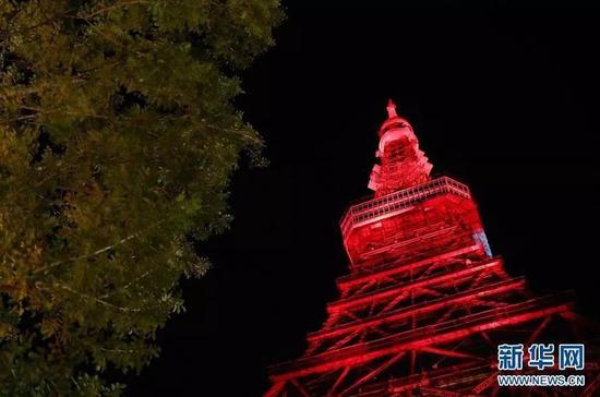 ▲ 資料圖片：2月4日晚，日本東京的地標性建築東京塔首次為慶祝中國春節點亮“中國紅”燈光裝飾。（新華社記者 杜瀟逸 攝）