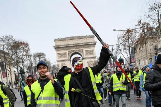 本周六，第五轮“黄背心”示威游行在巴黎继续上演。（图源：法新社）