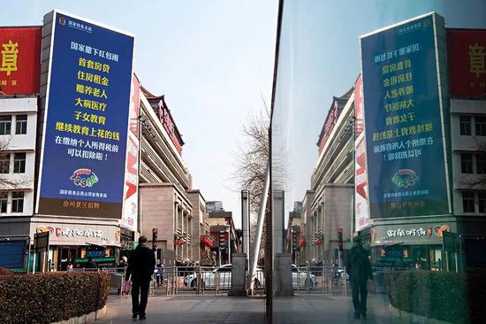 （2019 年1月4日，山西太原街头，电子大屏幕上滚动播放着“个人所得税六项扣除改革”的海报。图/ 中新）