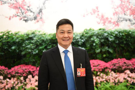 全国政协委员、中国侨联副主席朱奕龙