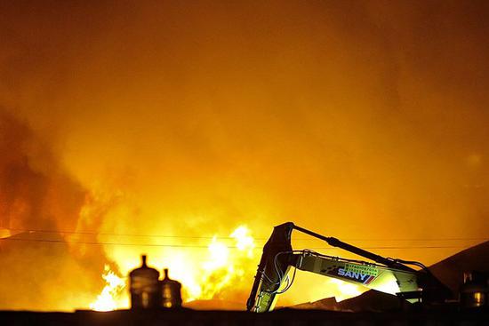 12月14日，由于未及时报警，导致火势蔓延。