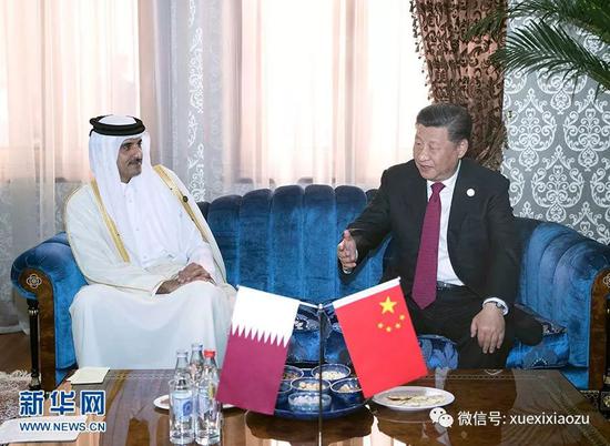 习近平会见卡塔尔埃米尔塔米姆