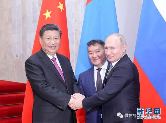 6月14日，习近平同俄罗斯总统普京、蒙古国总统巴特图勒嘎举行中俄蒙三国元首第五次会晤。
