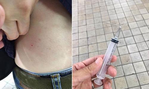 游客离奇被韩国老妇用注射器刺进身体,事件起因不明