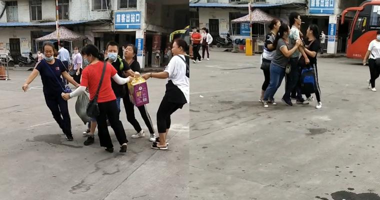 男子刚出站就被中年妇女盯上 左右拉扯抢行李一脸懵