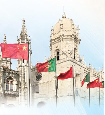 里斯本街头中葡两国国旗迎风飘扬，欢迎习近平主席。