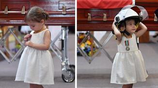 澳消防员葬礼：2岁幼女戴父亲安全帽悼念